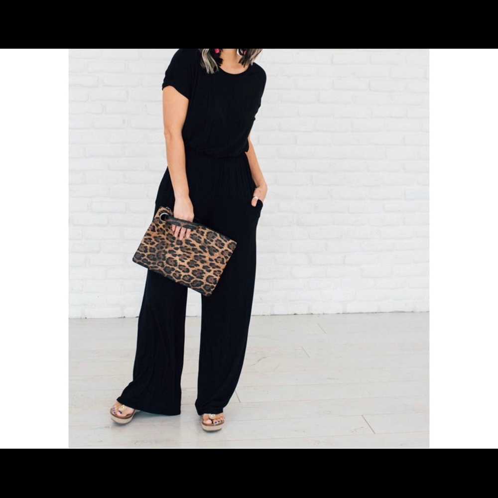 Black jumpsuit with hidden pockets.